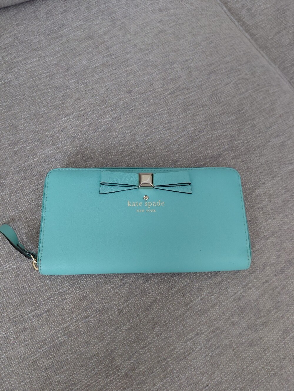 kate spade Turquoise Zip-Around Wallet with Bow Accent